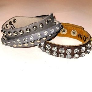 Set of 2 leather rhinstone and stud bracelets slightly blimished